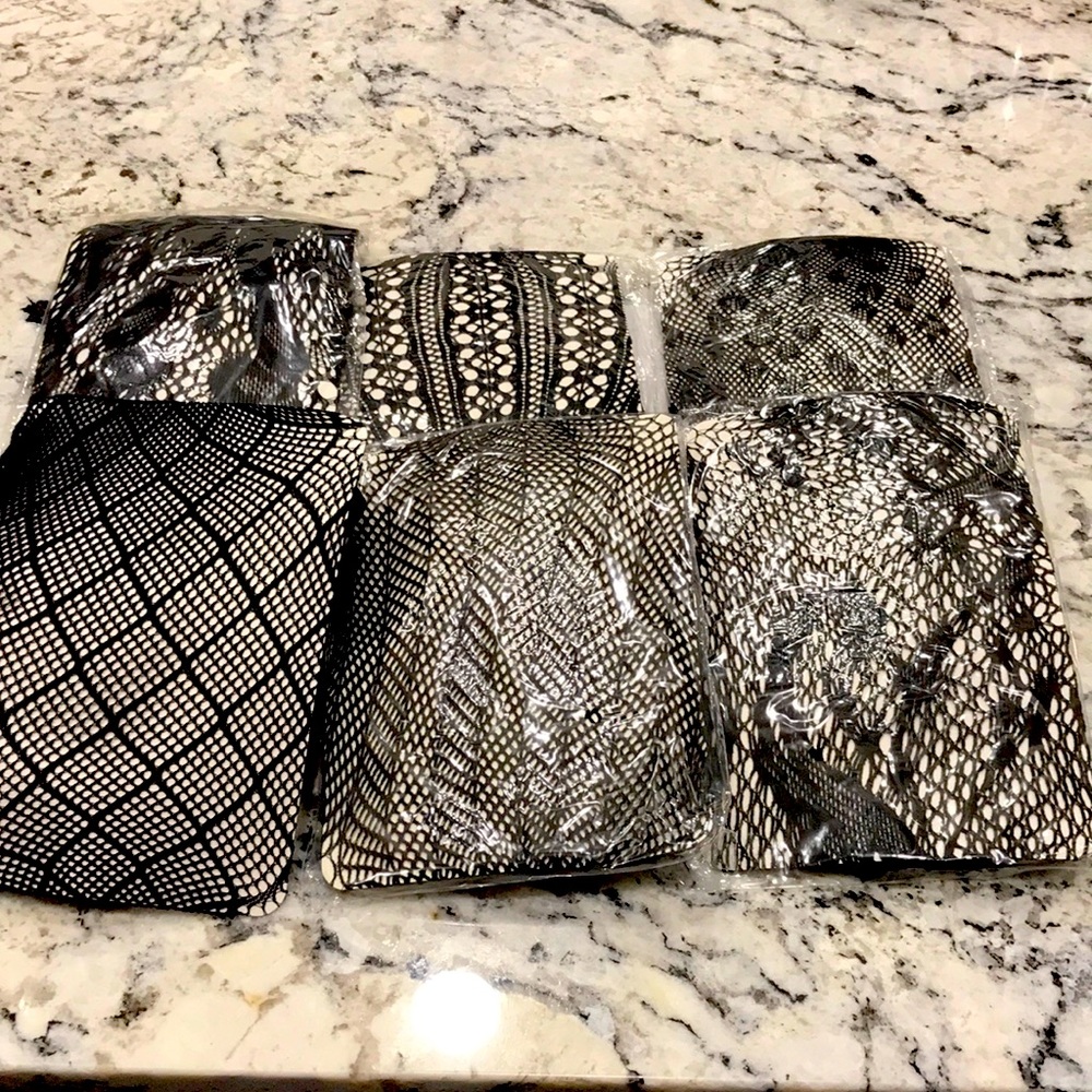 6 pairs multi-design, full-length fishnet stockings. Sold as a set.